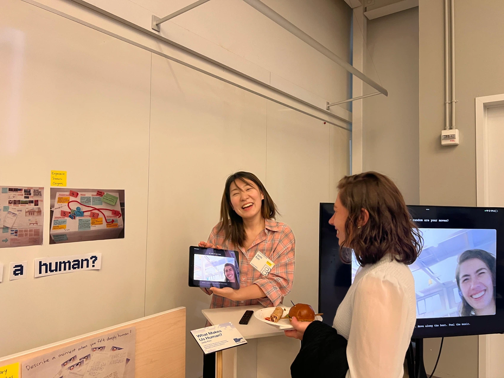 A visitor watching her own movement tracked on the screen